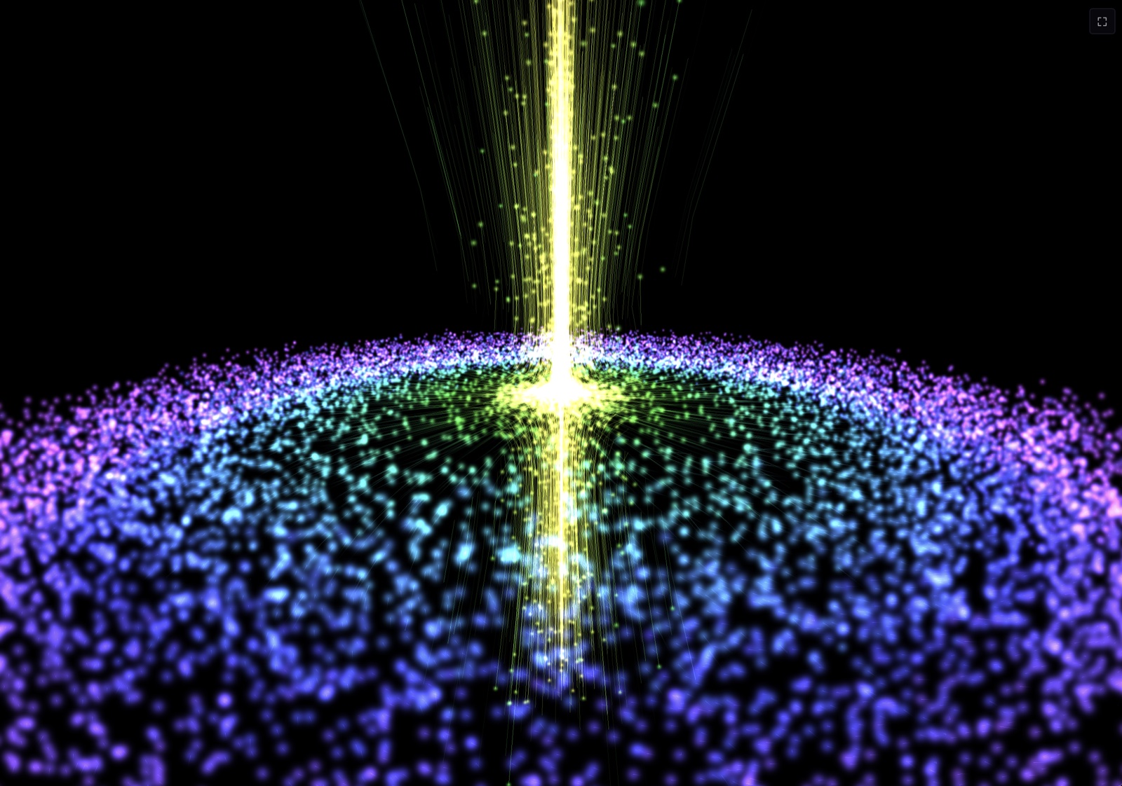 A rainbow-colored disc of particles spinning around a vertical axis, with a bright yellow jet leaving through the center.